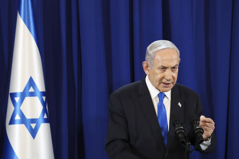 Israeli Prime Minister Benjamin Netanyahu speaks during a press conference in Tel Aviv, Israel, Saturday July 13, 2024. (Nir Elias/Pool Photo via AP)