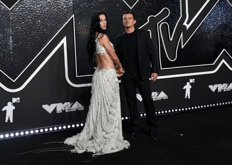 Katy Perry, left, and Orlando Bloom arrive at the MTV Video Music Awards on Wednesday, Sept. 11, 2024, at UBS Arena in Elmont, N.Y. (Photo by Evan Agostini/Invision/AP)