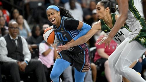 Atlanta Dream guard Jordin Canada (3) drives against Seattle Storm guard Skylar Diggins-Smith (4) during the second half at the Gateway Center Arena, Friday, August 16, 2024, in College Park. Atlanta Dream won 83-81 over Seattle Storm. (Hyosub Shin / AJC)