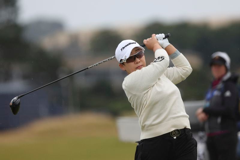 Jiyai Shin of South Korea plays off the 3rd tee during the final round of the Women's British Open golf championship, in St. Andrews, Scotland, Sunday, Aug. 25, 2024. (AP Photo/Scott Heppell)