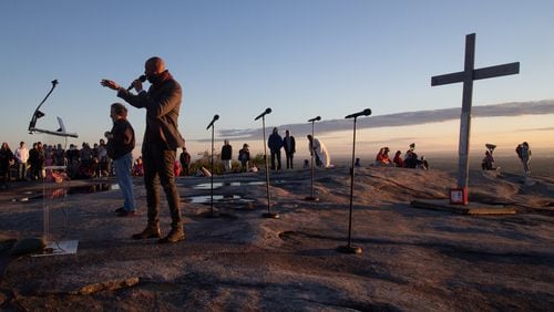 Montell Jordan delivers the Message to the crowd at the 75th Annual Easter Sunrise Service on the top of Stone Mountain last year. Jordan, a former Billboard Top Ten artist, now serves as executive pastor for Victory World Church in Norcross. A similar Easter service at Kennesaw Mountain National Battlefield Park has been canceled, and the Stone Mountain service could be canceled this year due to the coronavirus. STEVE SCHAEFER / SPECIAL TO THE AJC