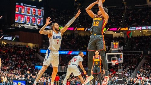 Atlanta Hawks forward De'Andre Hunter (12) shoots one from the field on Monday, Feb. 5, 2024 during a game between the Los Angeles Clippers and Atlanta Hawks at State Farm Arena in Atlanta, Georgia.  (Jason Allen for the Atlanta Journal Constitution)