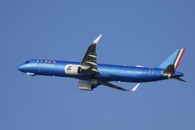 The ITA Airways ITY4000 papal plane with Pope Francis and bound to Luxembourg, where the pope will start his four-day visit to Luxembourg and Belgium, takes off from the Fiumicino International airport Leonardo da Vinci, some 30 kilometers south-west of Rome, Thursday, Sept. 26, 2024. (AP Photo/Gregorio Borgia)