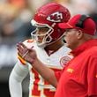 Kansas City Chiefs quarterback Patrick Mahomes, left, talks with head coach Andy Reid during the second half of an NFL football game against the Los Angeles Chargers Sunday, Sept. 29, 2024, in Inglewood, Calif. (AP Photo/Ashley Landis)