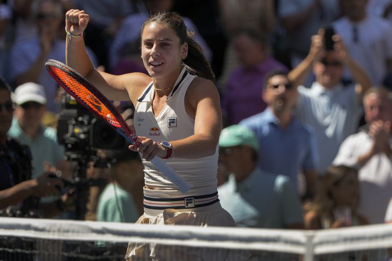 Emma Navarro, of the United States, reacts after defeating Paula Badosa, of Spain, during the quarterfinals of the U.S. Open tennis championships, Tuesday, Sept. 3, 2024, in New York. (AP Photo/Pamela Smith)