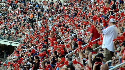 Atlanta Braves fans wave red styrofoam tomahawks in 2018.