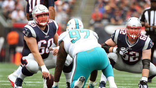 Patriots center David Andrews, left, and guard Joe Thuney helped form a solid middle of the offensive line but both are free agents this offseason.