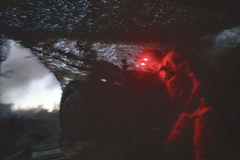 A Ukrainian serviceman of Liut brigade fires by his D-30 artillery cannon towards Russian position near Toretsk, Donetsk region, Ukraine, Sunday Sept. 22, 2024. (AP Photo/Evgeniy Maloletka)