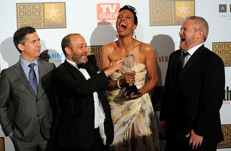 From left, Chris Parnell, H. Jon Benjamin, Aisha Tyler and Adam Reed pose backstage with the Critics' Choice award for best animated series for "Archer."