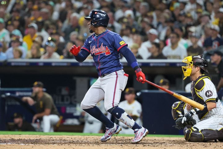 Atlanta Braves second baseman Ozzie Albies (1) singles against the San Diego Padres during the eighth inning of National League Division Series Wild Card Game One at Petco Park in San Diego on Tuesday, Oct. 1, 2024.   (Jason Getz / Jason.Getz@ajc.com)