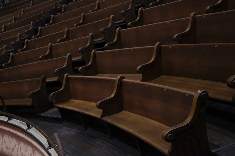 The original wooden pews of the Union Gospel Tabernacle are seen at the Ryman Auditorium in Nashville, Tenn., on July 30, 2024. (AP Photo/Luis Andres Henao)