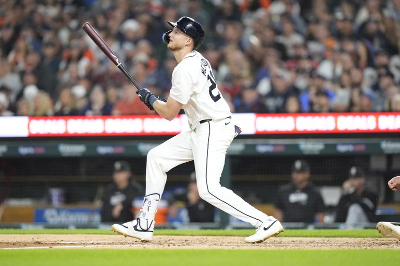 Detroit Tigers outfielder Parker Meadows connects for a single during the fifth inning of a baseball game against the Chicago White Sox, Friday, Sept. 27, 2024, in Detroit. (AP Photo/Carlos Osorio)