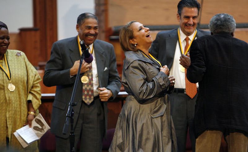 Cathy Hughes, middle, was among the thirteen inductees honored during the International Civil Rights Walk of Fame induction ceremony at the Ebenezer Baptist Church Saturday, Jan. 24. Hughes is the founder and chairperson of Radio One, Inc., the largest African-American owned and operated broadcast company in the nation. Hughes also made history by becoming the first African-American woman with a company on the stock exchange. Other inductees incl