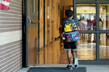 Myles, 6, started elementary school this year. Days after the mass shooting at Apalachee High School where four people were killed and nine others injured, he was preparing for his first hard lockdown drill. Photo credit: Nicole Williams