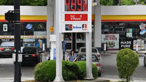 June 7, 2022 Atalnta - A customer pumps gas at Shell gas station, where the regular price of gasoline approaches close to $5 a gallon, on Peachtree Road near Piedmont Atlanta Spine Center in Buckhead on Tuesday, June 6, 2022. Georgia gas prices hit new heights on Tuesday, according to AAA, with an average statewide cost of $4.33 for a gallon of regular unleaded fuel. That’s still well below the national average of $4.92 per gallon.(Hyosub Shin / Hyosub.Shin@ajc.com)