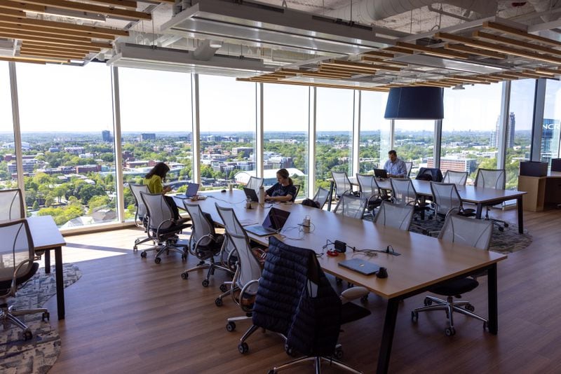 Employees work at Cisco’s new office space at Coda in Atlanta on Tuesday, April 11, 2023. (Arvin Temkar / arvin.temkar@ajc.com)