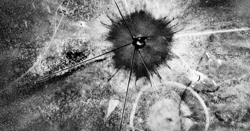 FILE - This photo shows an aerial view after the first atomic explosion at Trinity Test Site, in N.M., on July 16, 1945. (AP Photo, File)