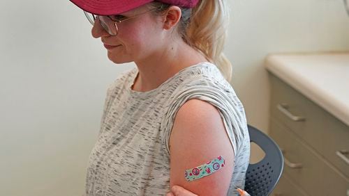 A nurse gives Michaella a measles, mumps and rubella virus vaccine made by Merck at the Utah County Health Department on April 29, 2019, in Provo, Utah. These were Michaella's first ever vaccinations. She asked that only her first name be used. (George Frey/Getty Images/TNS)