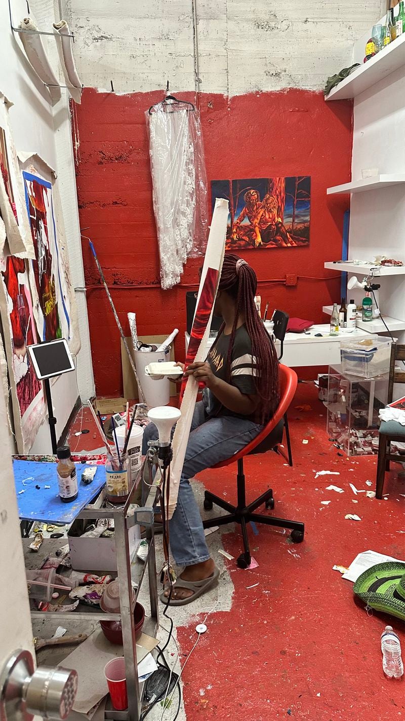 Visual artist Autumn Nelson starting to clear out her studio at Mint.