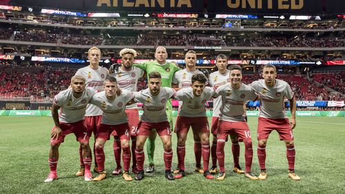 Atlanta United's starting 11 players pose before Wednesday's game against New England at Mercedes-Benz Stadium. (Eric Rossitch / Atlanta United)