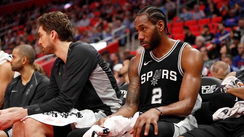 San Diego State forward Kawhi Leonard bites his jersey during an