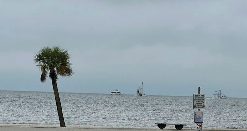 Boats leaving Pass Christian Harbor after mandatory evacuation issued Tuesday, Sept. 10, 2024, in Pass Christian, Miss., due to Tropical Storm Francine. (Hunter Dawkins/The Gazebo Gazette via AP)