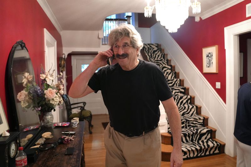 Gary Ruvkun, American molecular biologist, 2024 Nobel Prize winner in physiology or medicine, speaks on a phone, Monday, Oct. 7, 2024, at his home, in Newton, Mass. (AP Photo/Steven Senne)