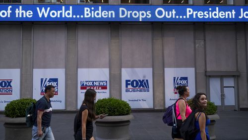 A news crawl appears on the side of the Fox News building in New York, Sunday, July 21, 2024, in the wake of President Joe Biden dropping out of the 2024 race for the White House. (AP Photo/Craig Ruttle)