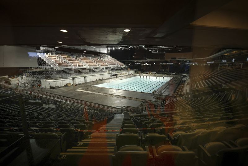 A view of the olympic swimming pool, Wednesday, June 12, 2024 at the Paris La Defense Arena, in Nanterre, outside Paris. The Paris La Defense Arena will host the swimming and some water polo events during the Paris 2024 Olympic Games. (AP Photo/Thomas Padilla)