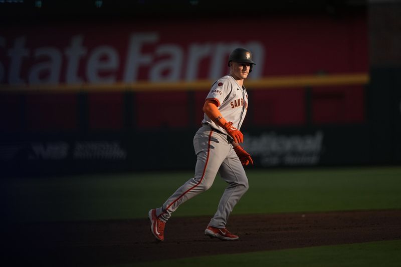 San Francisco Giants' Matt Chapman (26) leads off second base in the second inning of a baseball game against the Atlanta Braves, Wednesday, July 3, 2024, in Atlanta. (AP Photo/Brynn Anderson)