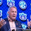 Auburn head football coach Hugh Freeze speaks during the Southeastern Conference NCAA college football media days Thursday, July 18, 2024, in Dallas. (AP Photo/LM Otero)