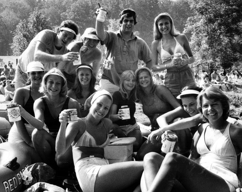 May 1978: Coeds from Florida State University, members of Delta Gamma sorority, take it easy with their friends at Powers Ferry Landing during the Chattahoochee Raft Race.
