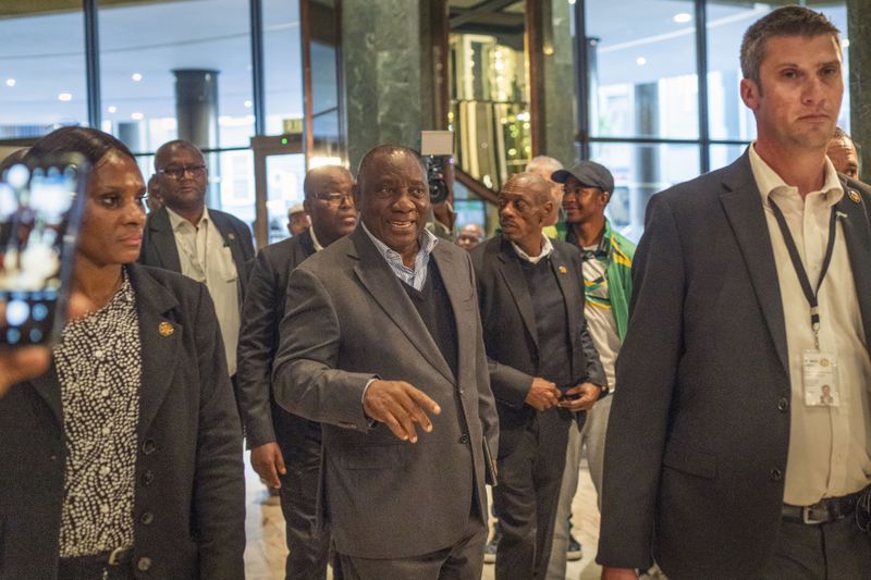 South African président Cyril Ramaphosa arrives at a Cape Town hotel to meets with Senior officials of the ANC during an ANC's National Executive Committee Thursday, June 13, 2024. South Africa's Parliament is due to elect a president Friday while major political parties are still working out a coalition agreement that might or might not see Ramaphosa return for a second term as leader of Africa's most industrialized economy. (AP Photo/Jerome Delay)