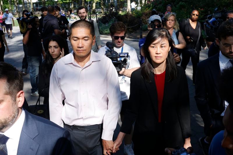 Former New York Governor Kathy Hochul aide Linda Sun, right, and her husband, Christopher Hu leave Brooklyn Federal Court after their arraignment, Tuesday, Sept. 3, 2024, in New York. Sun is charged with being an aide to the Chinese government. (AP Photo/Corey Sipkin)