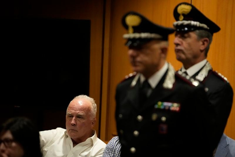 Ethan Elder, father of Finnegan Lee Elder, left, attends a hearing for the appeals trial in which his son is facing murder charges for killing Italian Carabinieri paramilitary police officer Mario Cerciello Rega, in Rome, Wednesday, July 3, 2024. (AP Photo/ Alessandra Tarantino)