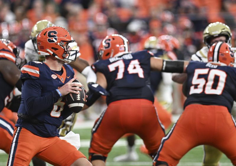 Syracuse quarterback Kyle McCord (6) looks to pass against Georgia Tech during the first half of an NCAA football game on Saturday, Sept. 7, 2024 in Syracuse, N.Y. Syracuse won 31-28. (AP Photo/Hans Pennink)