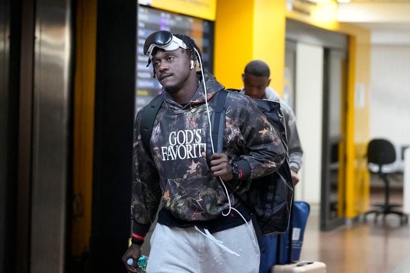 The Philadelphia Eagles' A.J. Brown arrives at Sao Paulo International airport ahead of a game against the Philadelphia Eagles, in Guarulhos, great Sao Paulo area, Wednesday, Sept. 4, 2024. (AP Photo/Andre Penner)