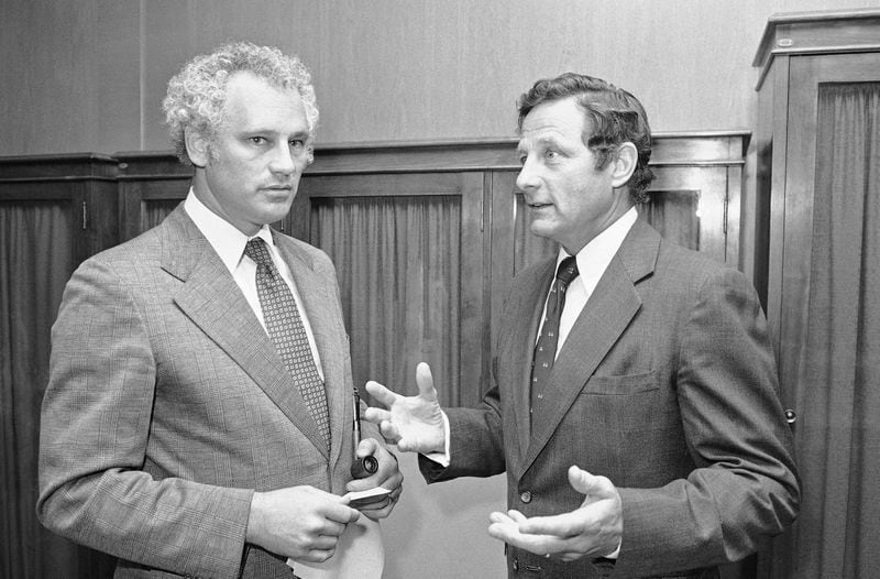 FILE - Sen. Birch Bayh, D-Ind., right, speaks with Transportation Secretary Neil Goldschmidt just before a hearing on June 24, 1980 in Washington of the Appropriations subcommittee on transportation. Goldschmidt, a former Oregon governor whose confession that he had sex with a 14-year-old girl in the 1970s blackened what had been a nearly sterling reputation, has died. He was 83. (AP Photo/Chick Harrity, File)