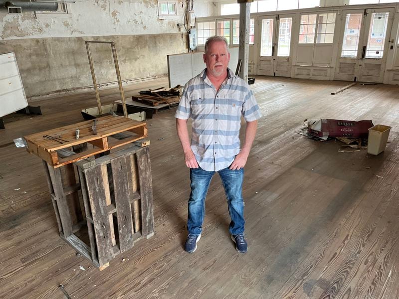 David McKeehan recently bought a vacant building he hopes to renovate in Twin City, Ga. Later, he was excited to hear about the proposed Georgia Hi-Lo Trail, which could pass nearby. He said it could attract more people to town. (Matt Kempner / mkempner@ajc.com)