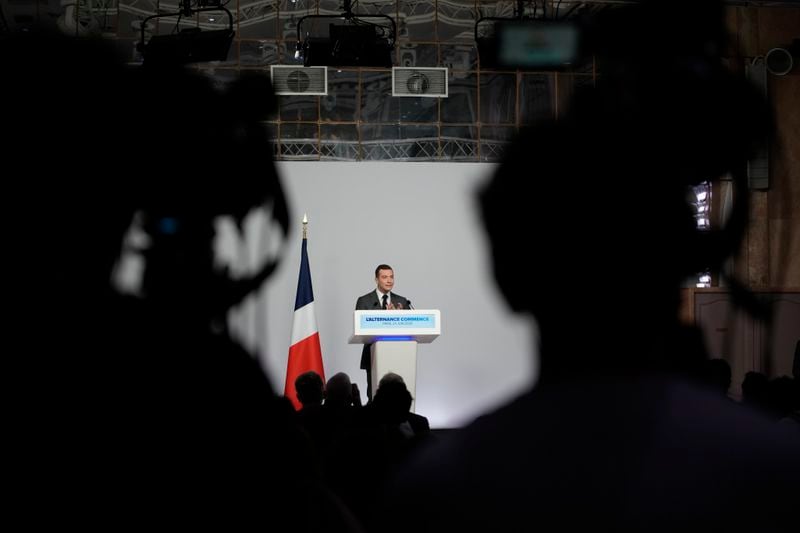 Far-right National Rally party president Jordan Bardella gives a press conference, Monday, June 24, 2024 in Paris. The upcoming two-round parliamentary election will take place on June 30 and July 7. (AP Photo/Christophe Ena)