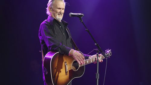 FILE - Artist and songwriter Kris Kristofferson performs "Sunday Morning Coming Down" at the Nashville Songwriters Association International "50 Years of Songs" at the Ryman Auditorium, Sept. 20, 2017, in Nashville, Tenn. (Photo by Laura Roberts/Invision/AP, File)