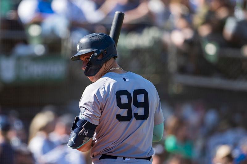 New York Yankees' Aaron Judge waits to bat during the seventh inning of a baseball game against the Oakland Athletics in Oakland, Calif., Sunday, Sept. 22, 2024. (AP Photo/Nic Coury)