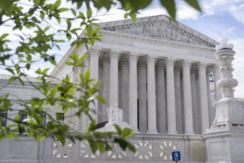 FILE - The Supreme Court building is seen on June 27, 2024, in Washington. Supreme Court justices will take the bench Monday, July 1, to release their last few opinions of the term, including their most closely watched case: whether former President Donald Trump has immunity from criminal prosecution. (AP Photo/Mark Schiefelbein, File)
