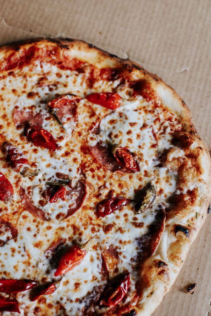 The Spicy pizza from Micah-Angelo's Pizza in Marietta is made with soppressata, Calabrian chiles and pearl mozzarella. / Photo courtesy of Alex Roberts