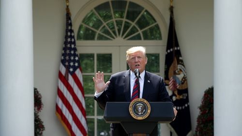 President Donald Trump speaks about his immigration proposal Thursday in the Rose Garden of the White House. The plan calls for a merit-based system that prioritizes high-skilled workers over those with family already in the country. It does not address young immigrants who are part of the Deferred Action for Childhood Arrivals program. (Photo by Alex Wong/Getty Images)