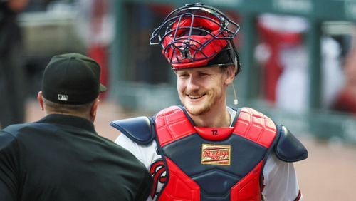 Sean Murphy greets the home plate umpire before their game against the Boston Red Sox at Truist Park, Tuesday, May 9, 2023, in Atlanta.