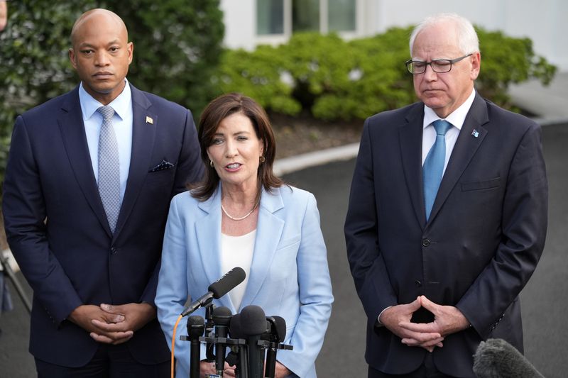 New York Gov. Kathy Hochul speaks to reporters after meeting with President Joe Biden, Wednesday, July 3, 2024, at the White House in Washington, as Maryland Gov. Wes Moore and Minnesota Gov. Tim Walz, right, listen. (AP Photo/Jacquelyn Martin)