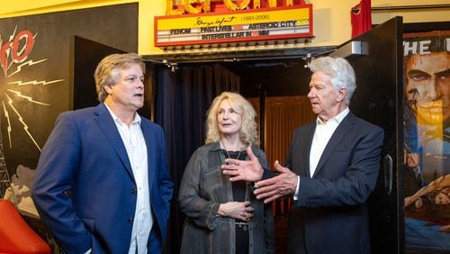 Ric Reitz, from left, Shea Griffin and Wilbur Fitzgerald speak to a reporter about Georgia’s film industry at the Plaza Theatre in Atlanta on Monday, July 10, 2023. (Arvin Temkar / arvin.temkar@ajc.com)