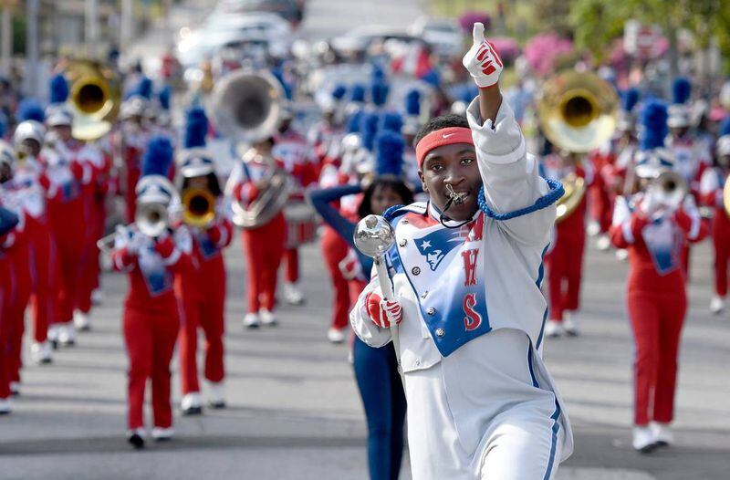 FILE: A drum major with the Southwest High Marching Patriots Band dances while the band performs along Mulberry Street during the 38th Cherry Blossom Festival Parade Sunday. (Photo Courtesy of Jason Vorhees/jvorhees@macon.com)
