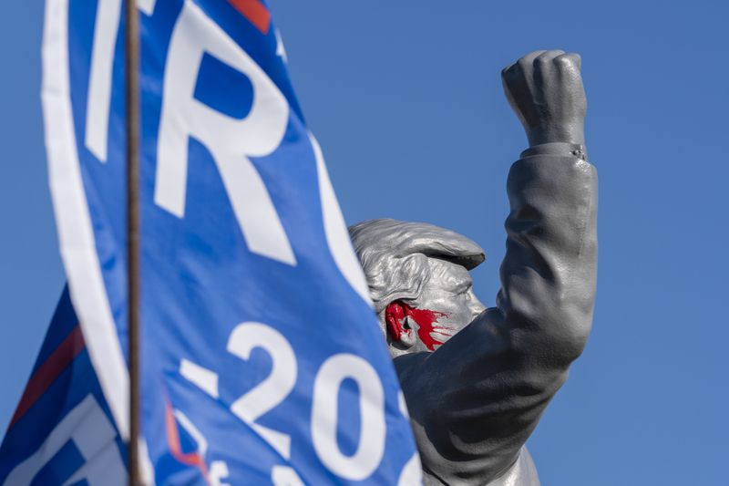 A statue of Republican presidential nominee former President Donald Trump is set up on a truck ahead of a campaign event at the Butler Farm Show, Friday, Oct. 4, 2024, in Butler, Pa. (AP Photo/Alex Brandon)